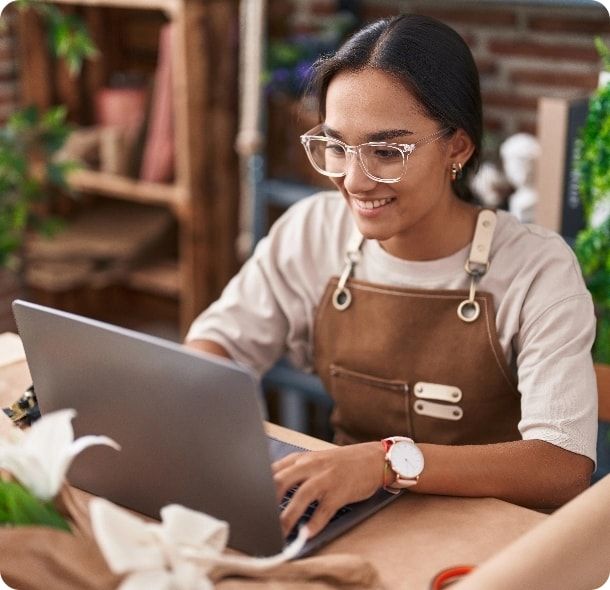 A young woman working on her laptop