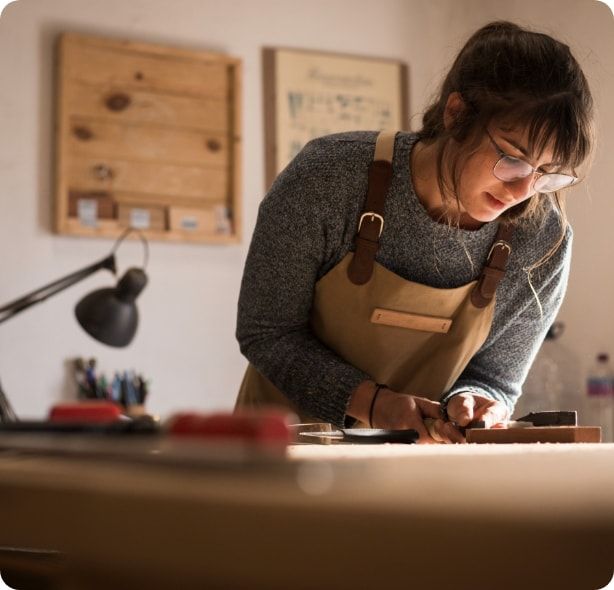 A woodworker in her shop.