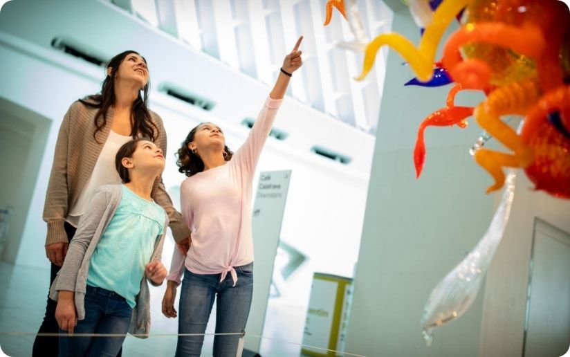 A family admires some art at the Milwaukee Art Museum. 